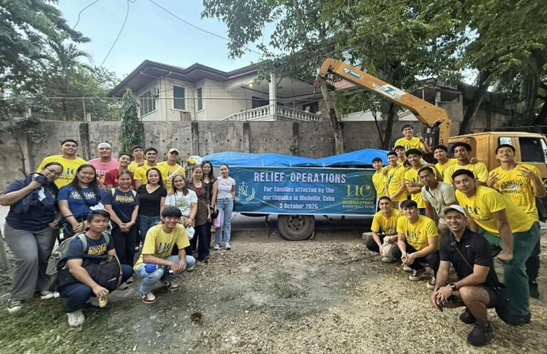 SN Law Firm and UC Webmasters distributing Cebu earthquake relief to families in Medellin